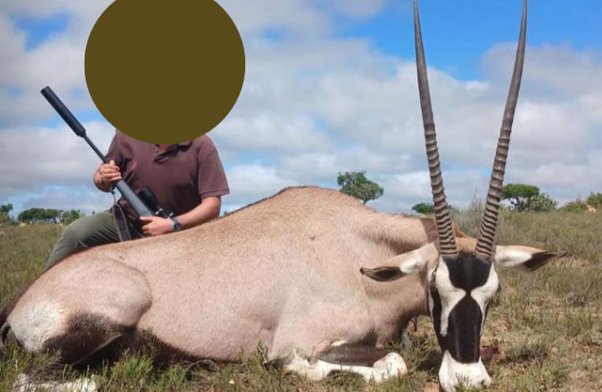 Spanish hunter with a Gemsbuck trophy during a South African hunting safari